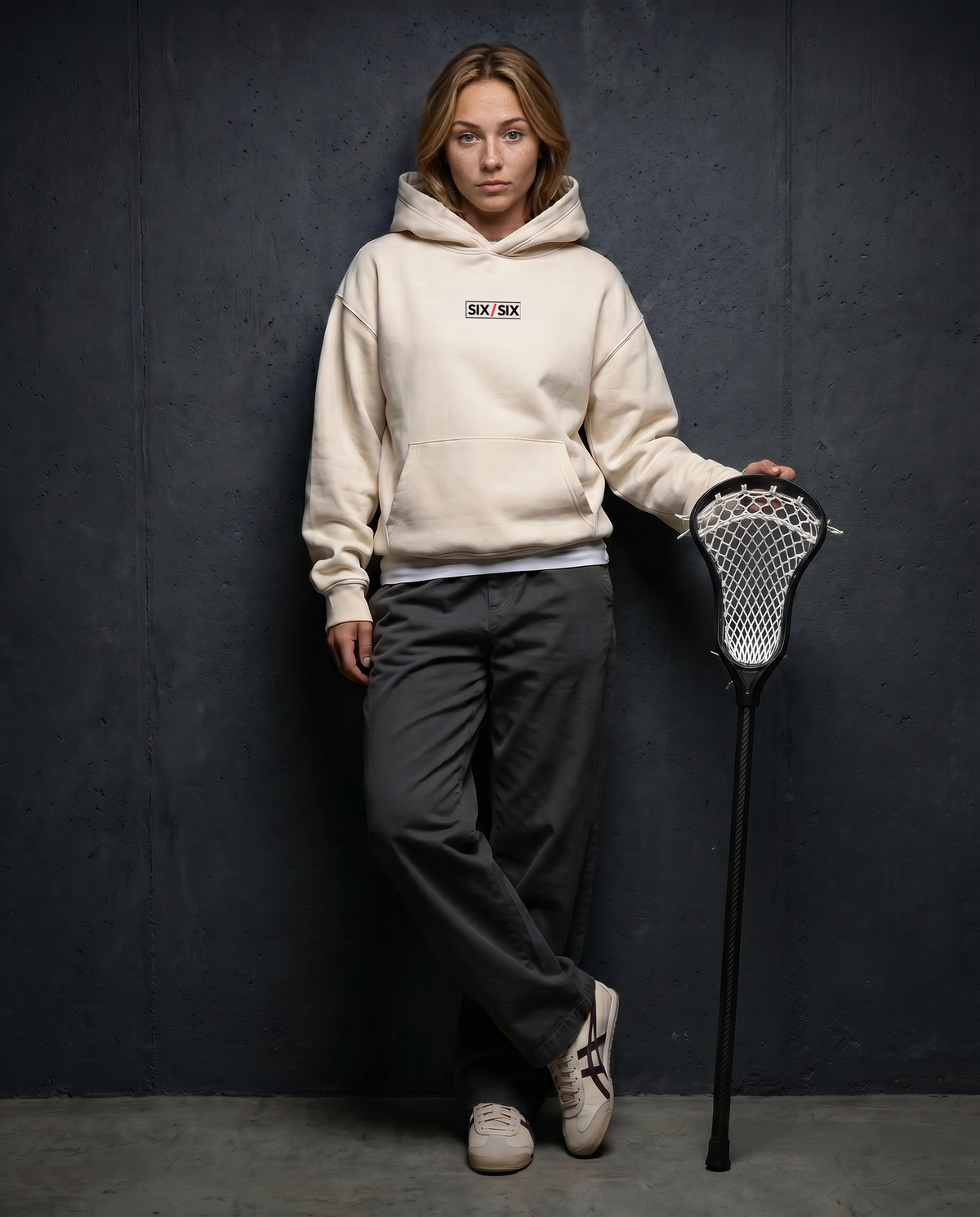 Lace — Blush — Women's model Reese, editorial with lacrosse stick, Natural #Model_F #Color_Natural #Design_Blush