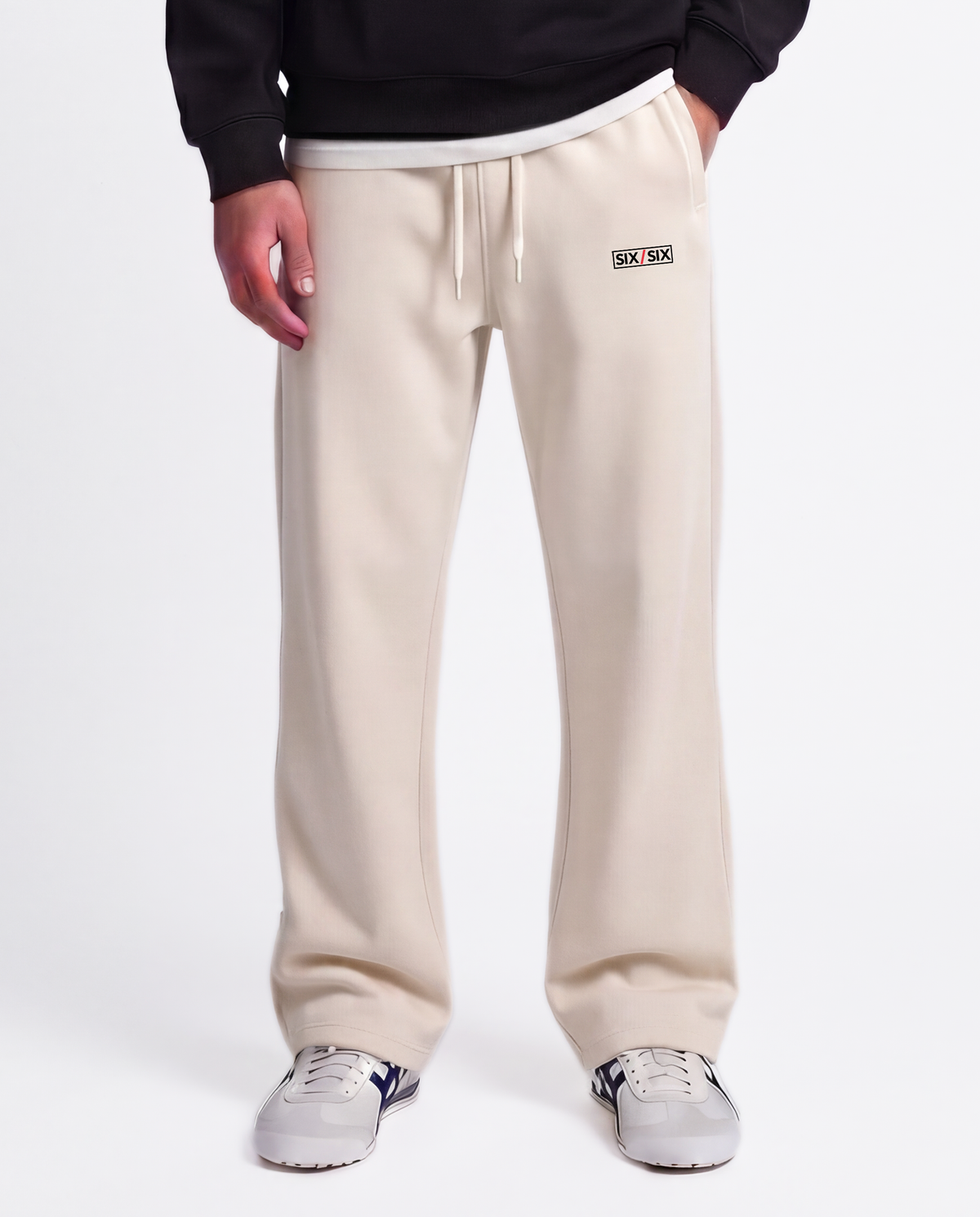 Essential Logo — Carrier Sweatpant — Male model close front (Brooks), Bone #Model_M #Color_Bone