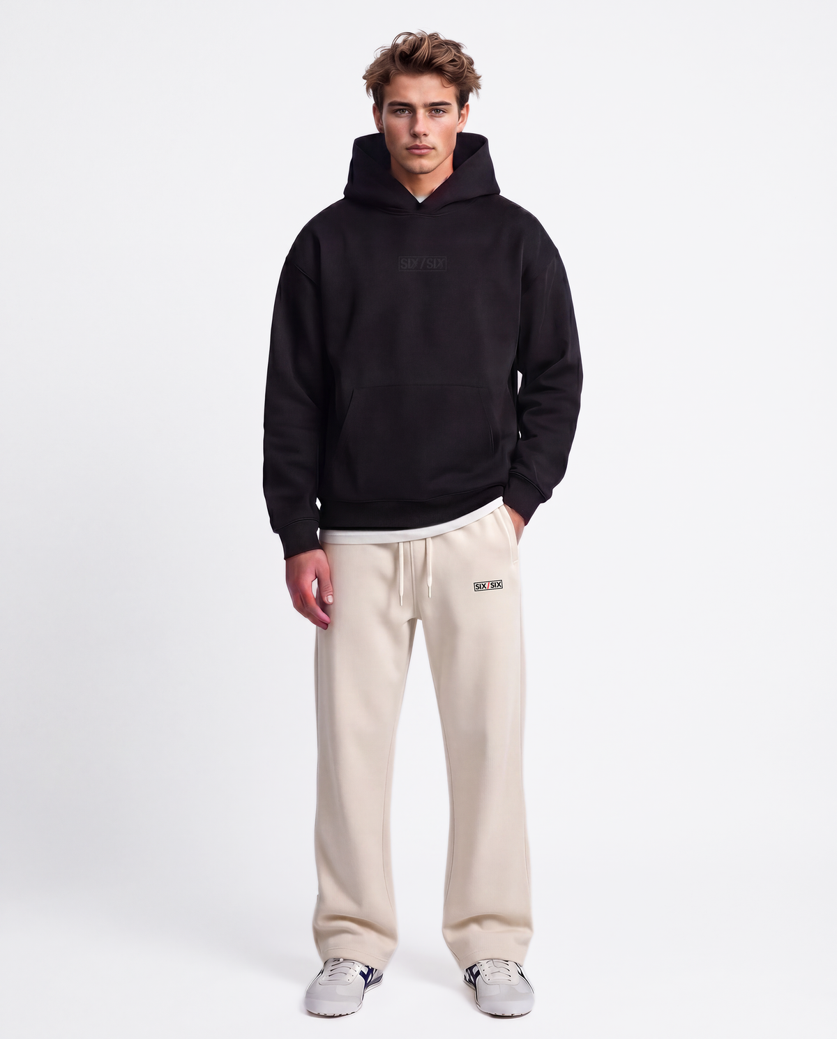 Essential Logo — Carrier Sweatpant — Male model full front (Brooks), Bone #Model_M #Color_Bone
