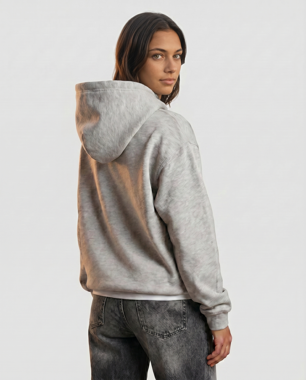 Starting Line — Logo Hoodie — Female model side profile (Kai), Marle Grey #Model_F #Color_Marle Grey