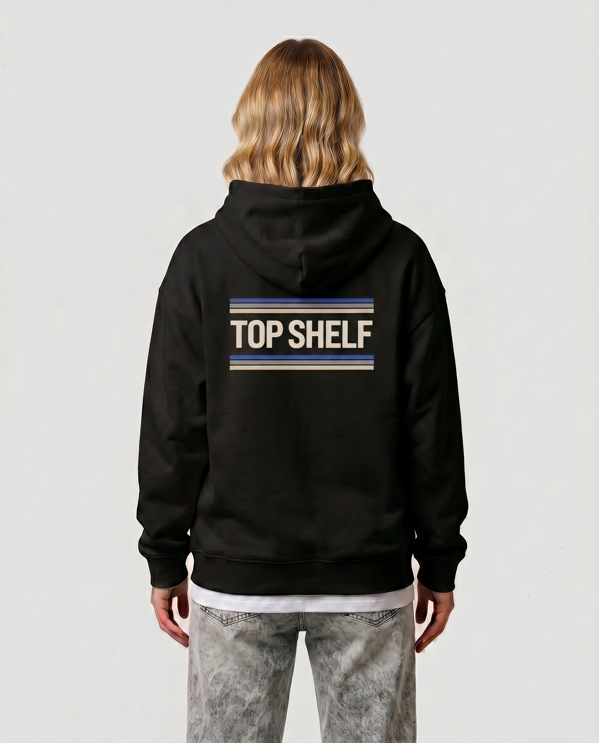 Lace — Cobalt Varsity — female model Reese, back view with cobalt laces graphic, Black #Model_F #Color_Black #Design_Cobalt Varsity