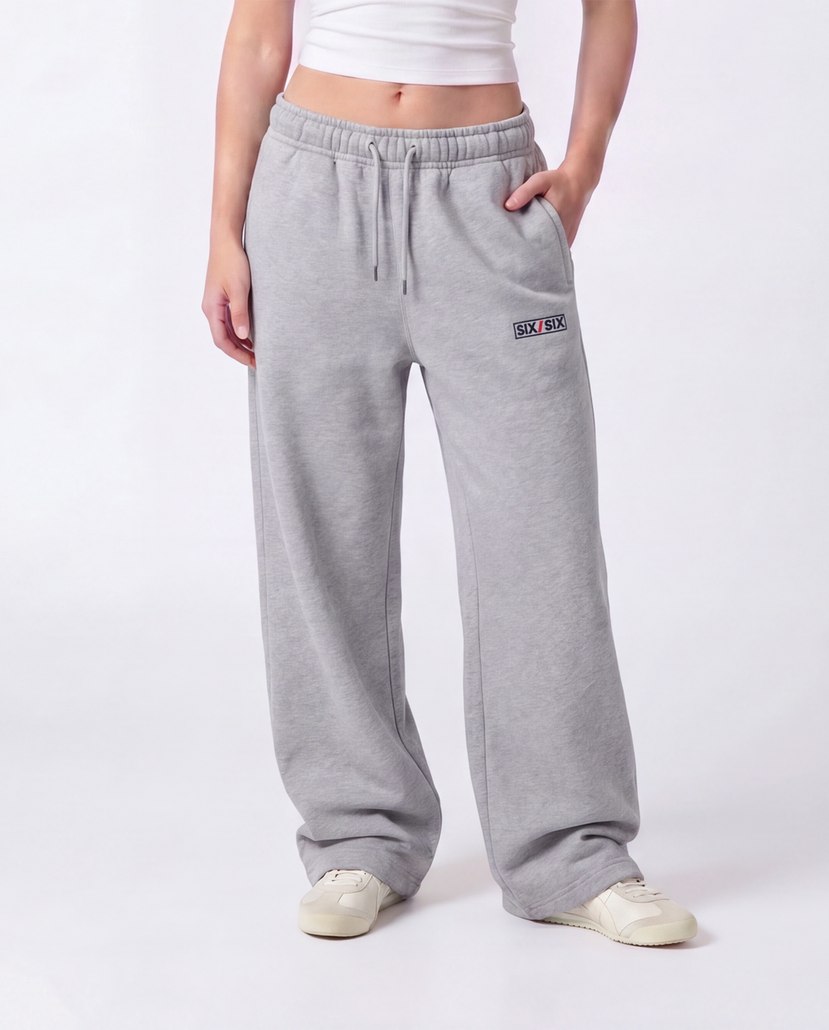 Essential Logo — Carrier Sweatpant — Female model close front (Reese), Marle #Model_F #Color_Marle