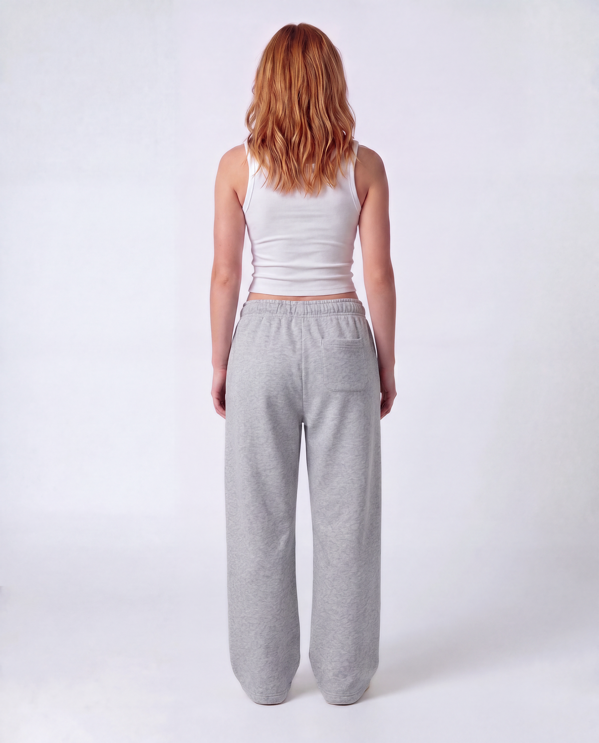Essential Logo — Carrier Sweatpant — Female model full back (Reese), Marle #Model_F #Color_Marle