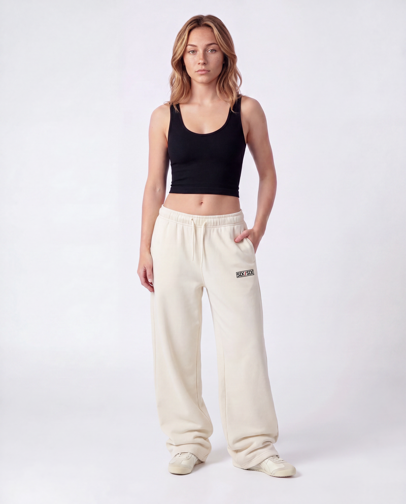 Essential Logo — Carrier Sweatpant — Female model full front (Reese), Bone #Model_F #Color_Bone