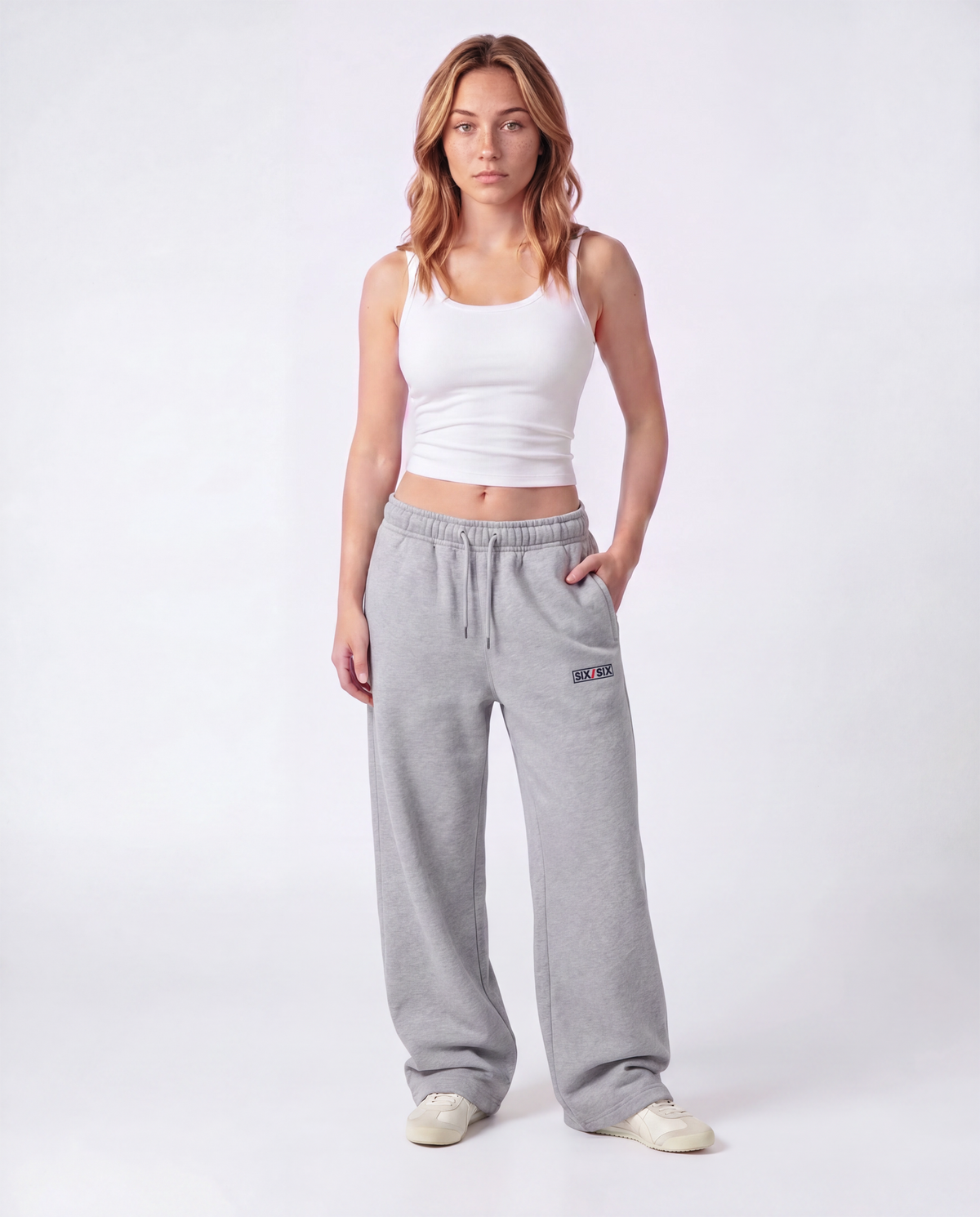 Essential Logo — Carrier Sweatpant — Female model full front (Reese), Marle #Model_F #Color_Marle