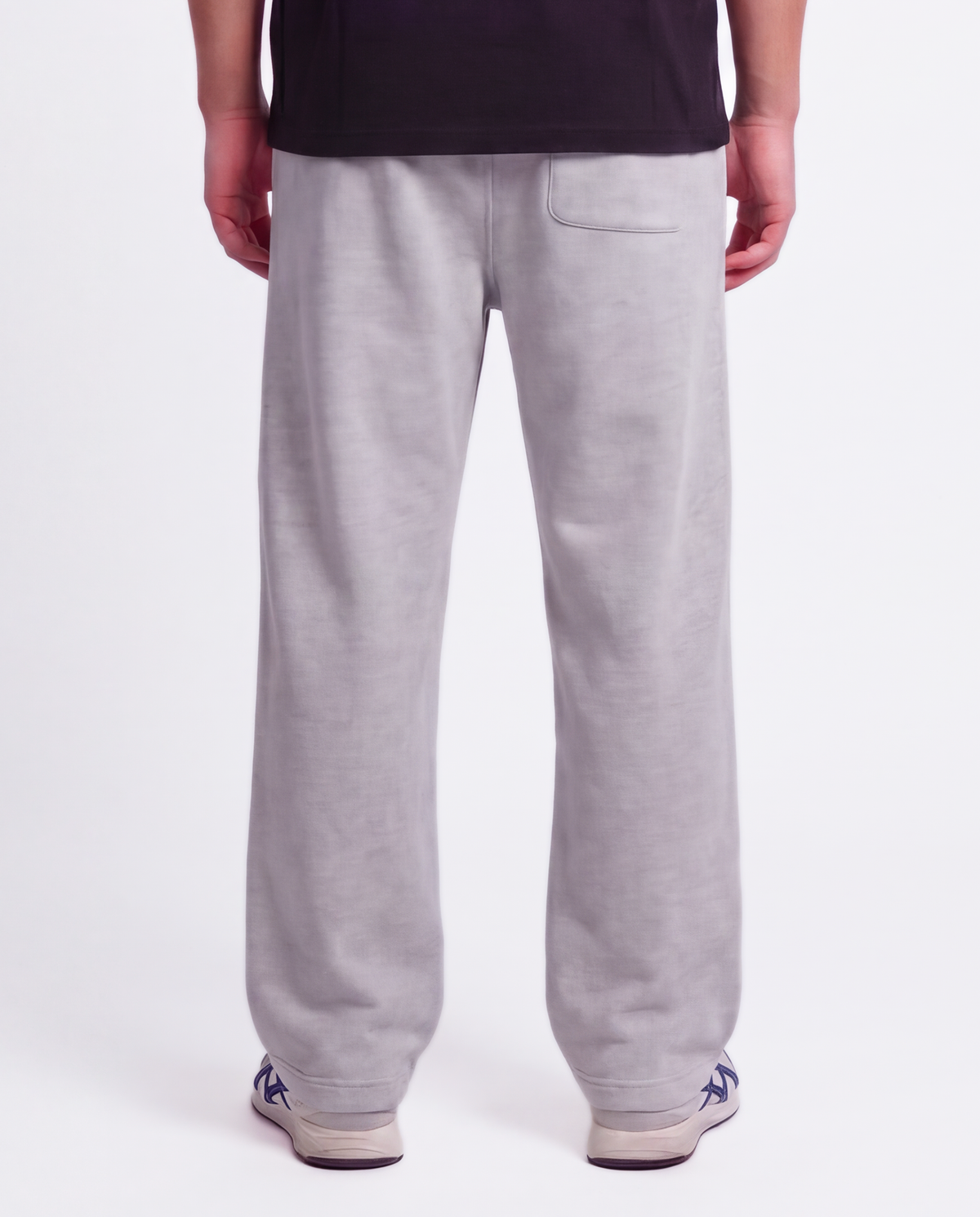 Essential Logo — Carrier Sweatpant — Male model close back (Brooks), Marle #Model_M #Color_Marle