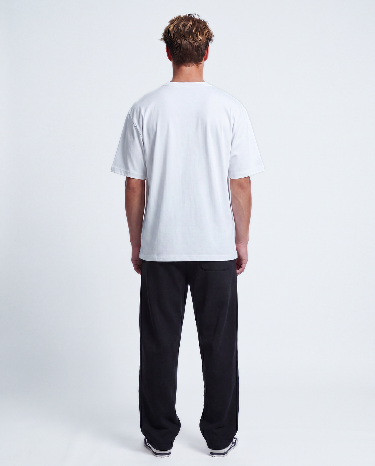 Essential Logo — Carrier Sweatpant — Male model full back (Brooks), Black #Model_M #Color_Black