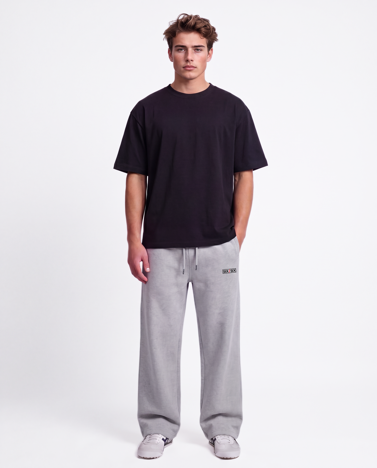 Essential Logo — Carrier Sweatpant — Male model full front (Brooks), Marle #Model_M #Color_Marle