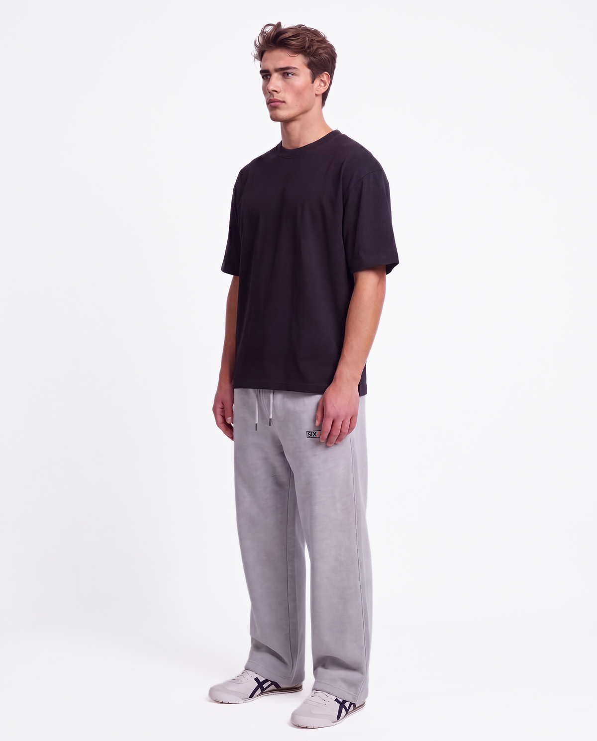 Essential Logo — Carrier Sweatpant — Male model full side (Brooks), Marle #Model_M #Color_Marle