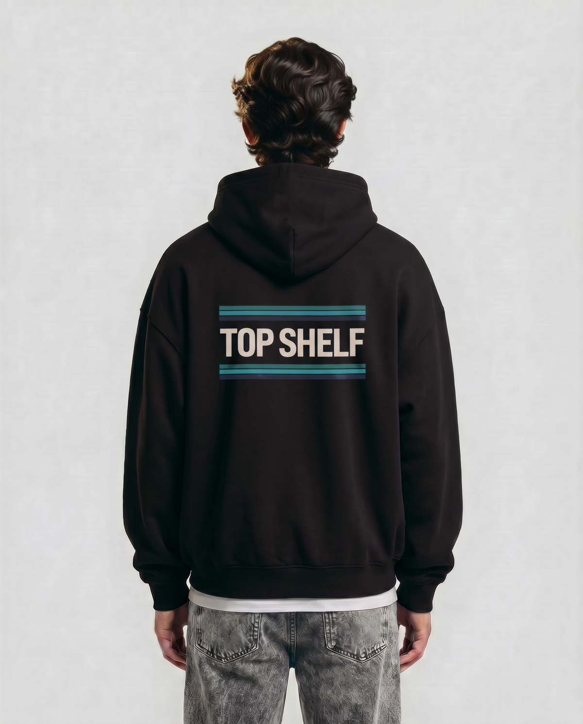 Lace — Riptide — Men's model Enzo, back view with teal laces graphic, Black #Model_M #Color_Black #Design_Riptide