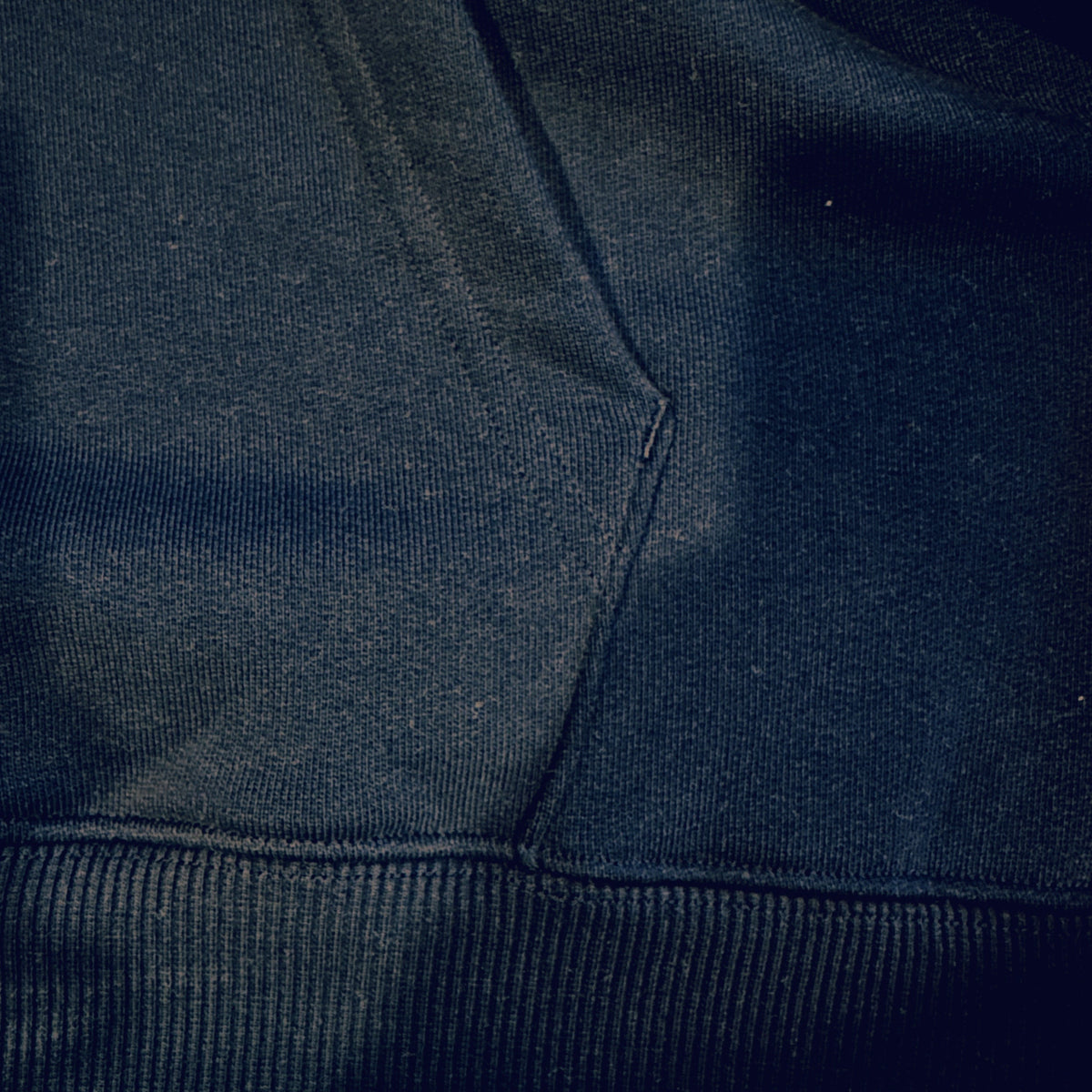 Built For The Cage — Hoodie — hem and rib of the actual garment, in hand, Black #Color_Black