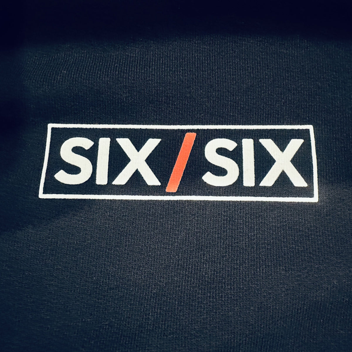 Founders Class — Hoodie — the printed Six / Six chest mark on the actual garment, 500 GSM French terry, Black #Color_Black