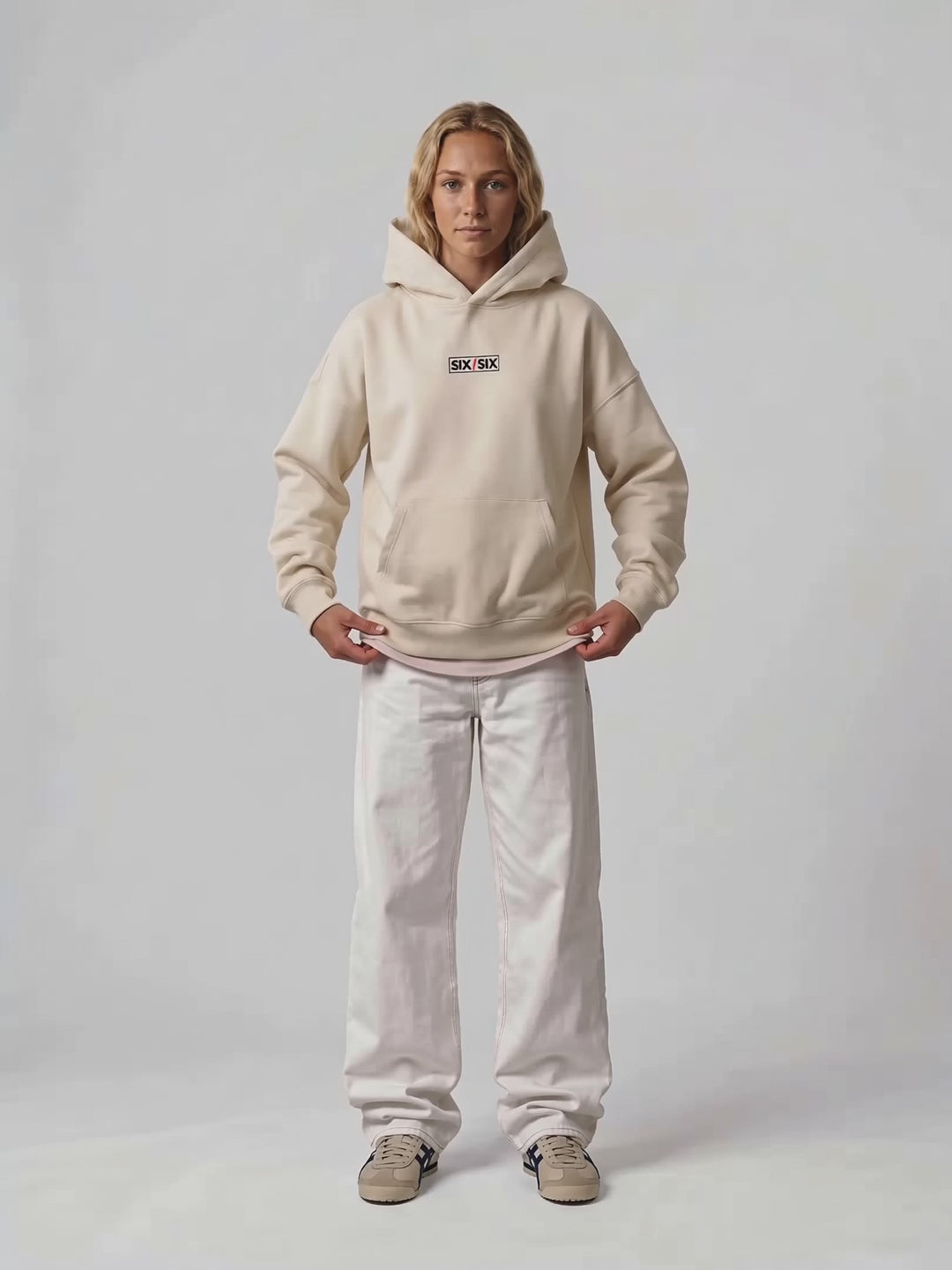 Corners Only hoodie PDP video — female model Sloane, hood-up turnaround #Model_F