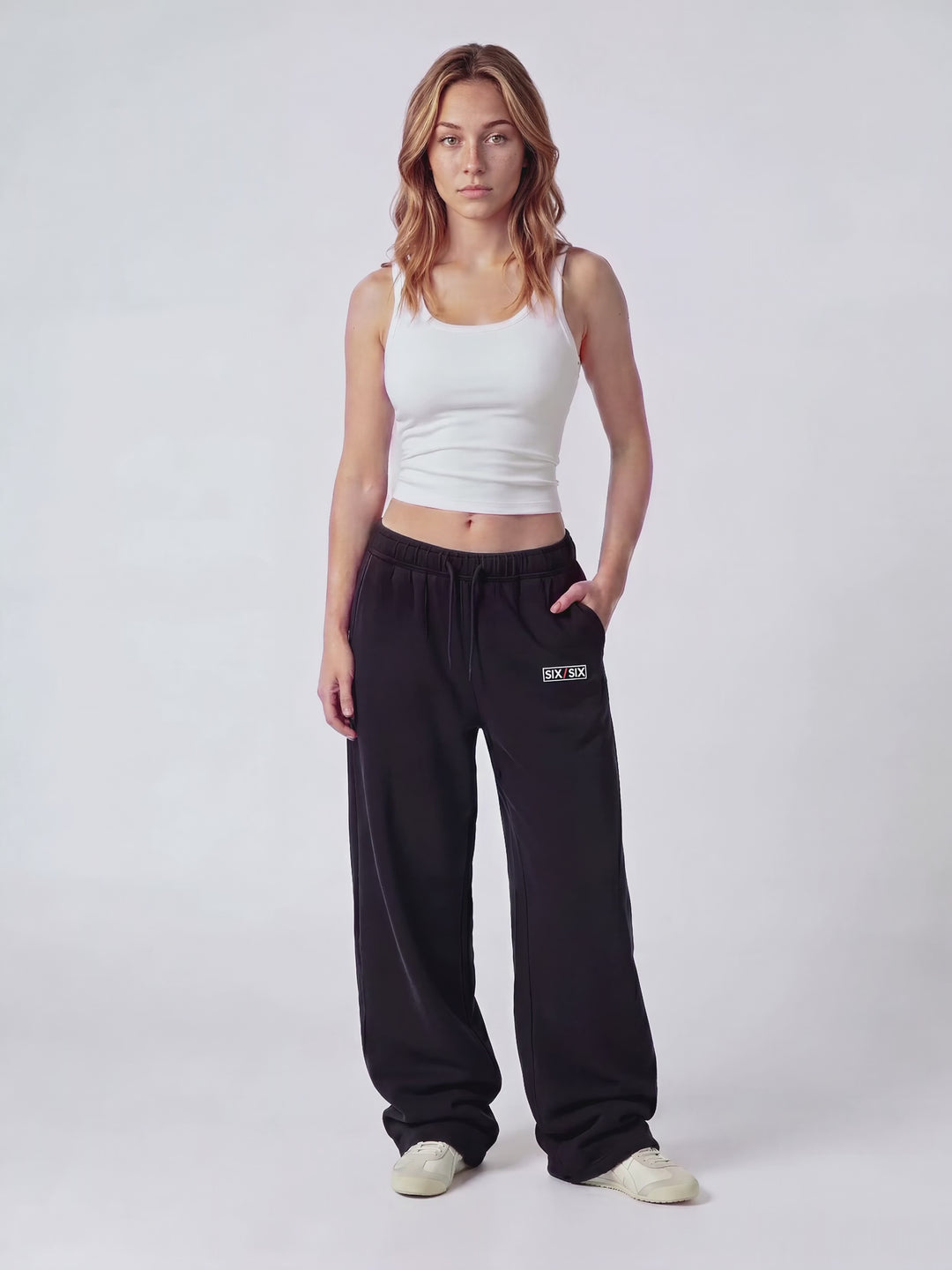 Essential Logo — Carrier Sweatpant — PDP video (Reese), Black — web